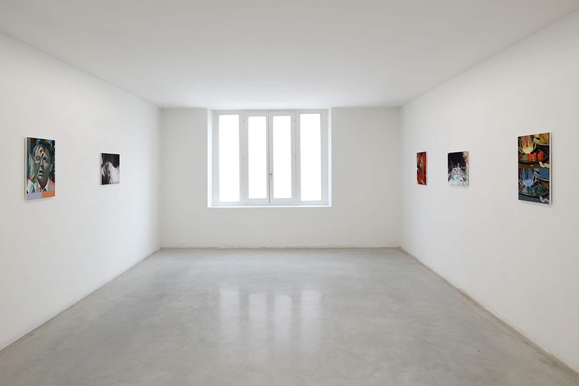 Workplace's booth at Hit! Micro Fair in Verona, Italy with paintings by Katinka Lampe, Laura Lancaster, Rachel Lancaster and Robin Megannity.