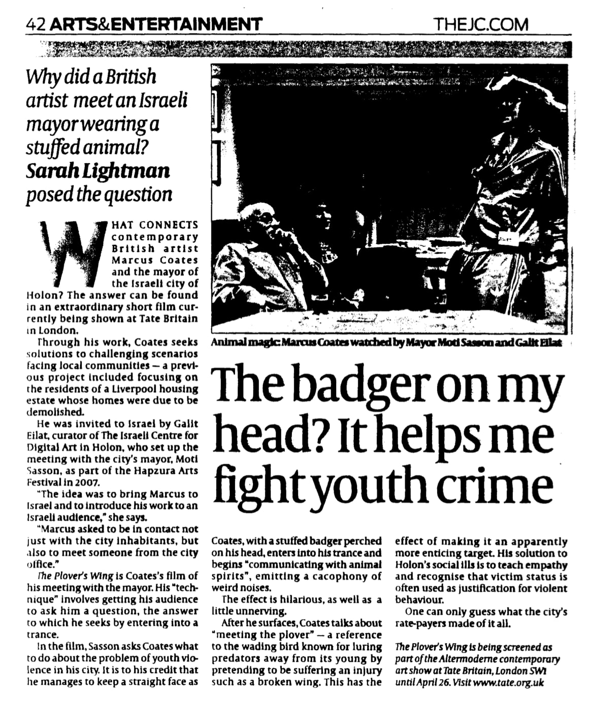 The badger on my head? It helps me fight youth crime Why did a British artist meet an Israeli mayor wearing a stuffed animal?