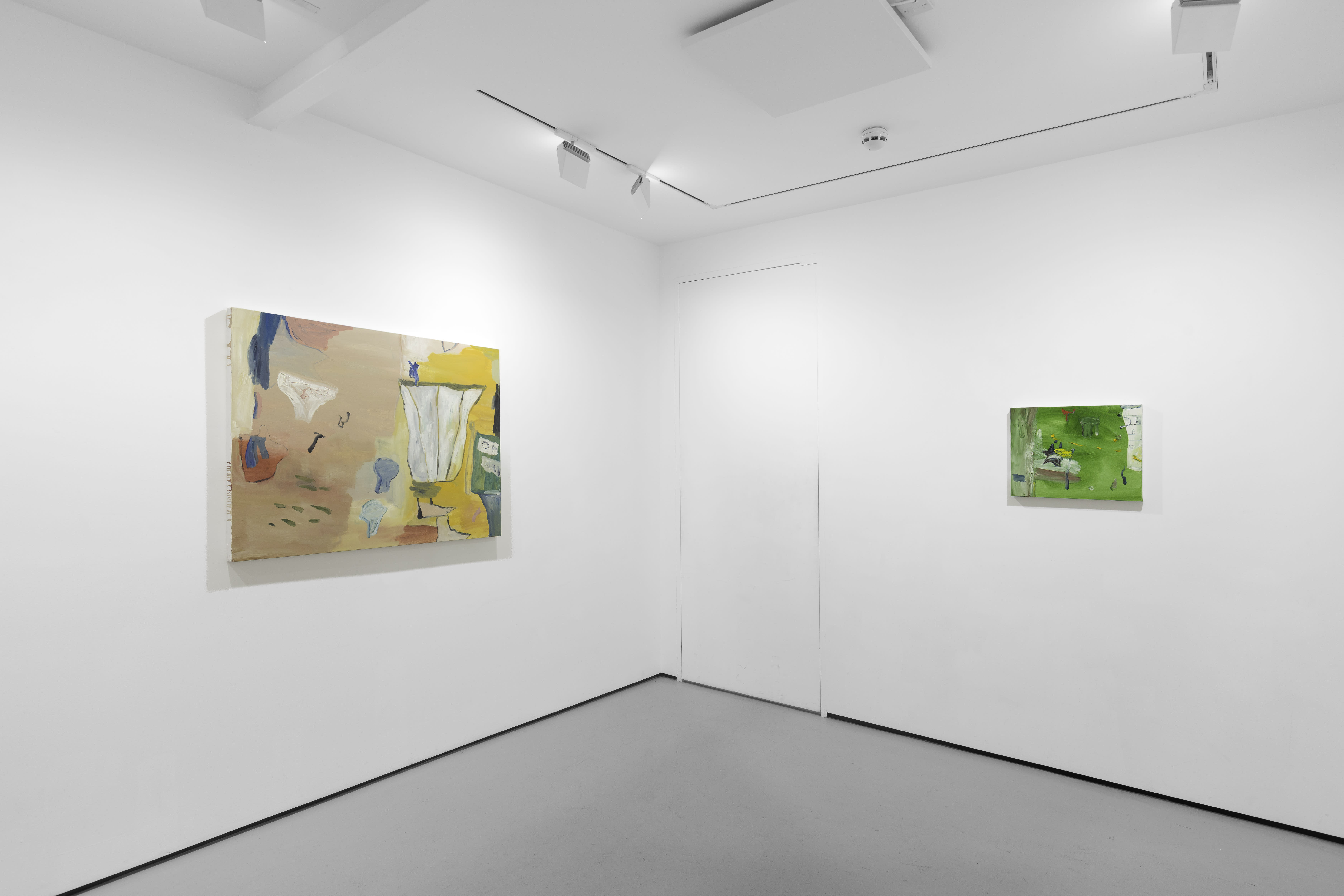 A white walled gallery with 4 artworks by b chehayeb hung on the walls