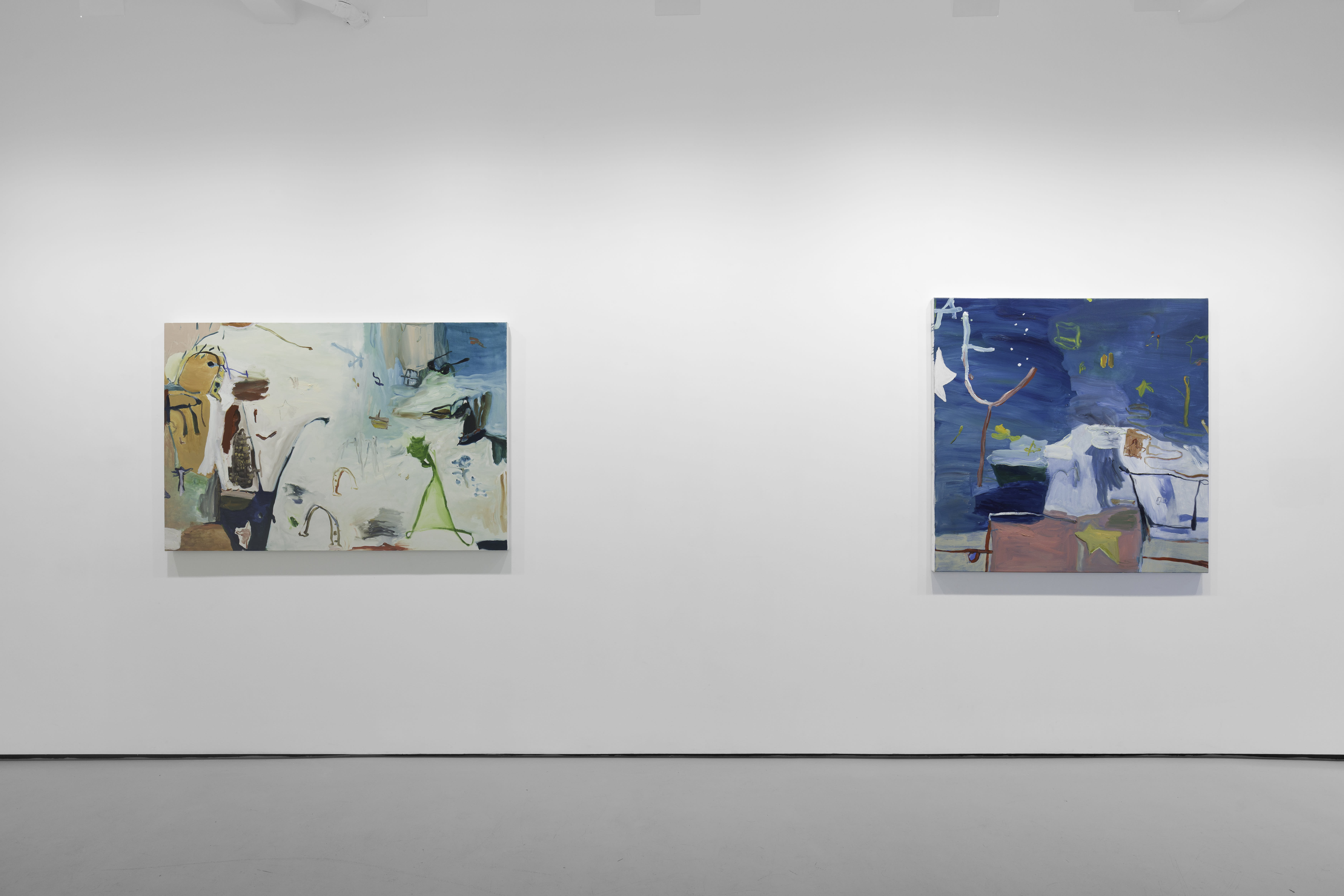 A white walled gallery with 4 artworks by b chehayeb hung on the walls