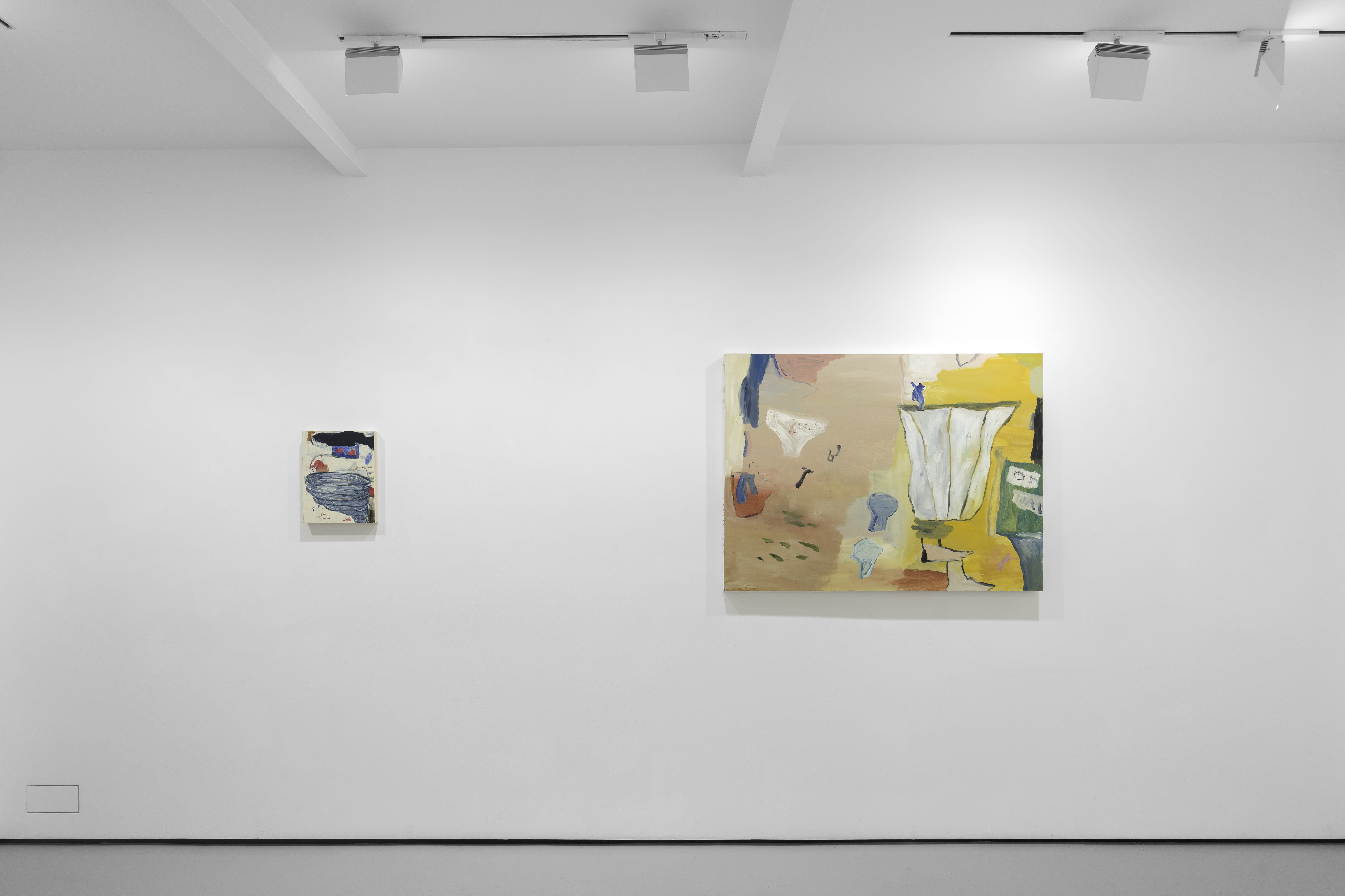 A white walled gallery with 4 artworks by b chehayeb hung on the walls