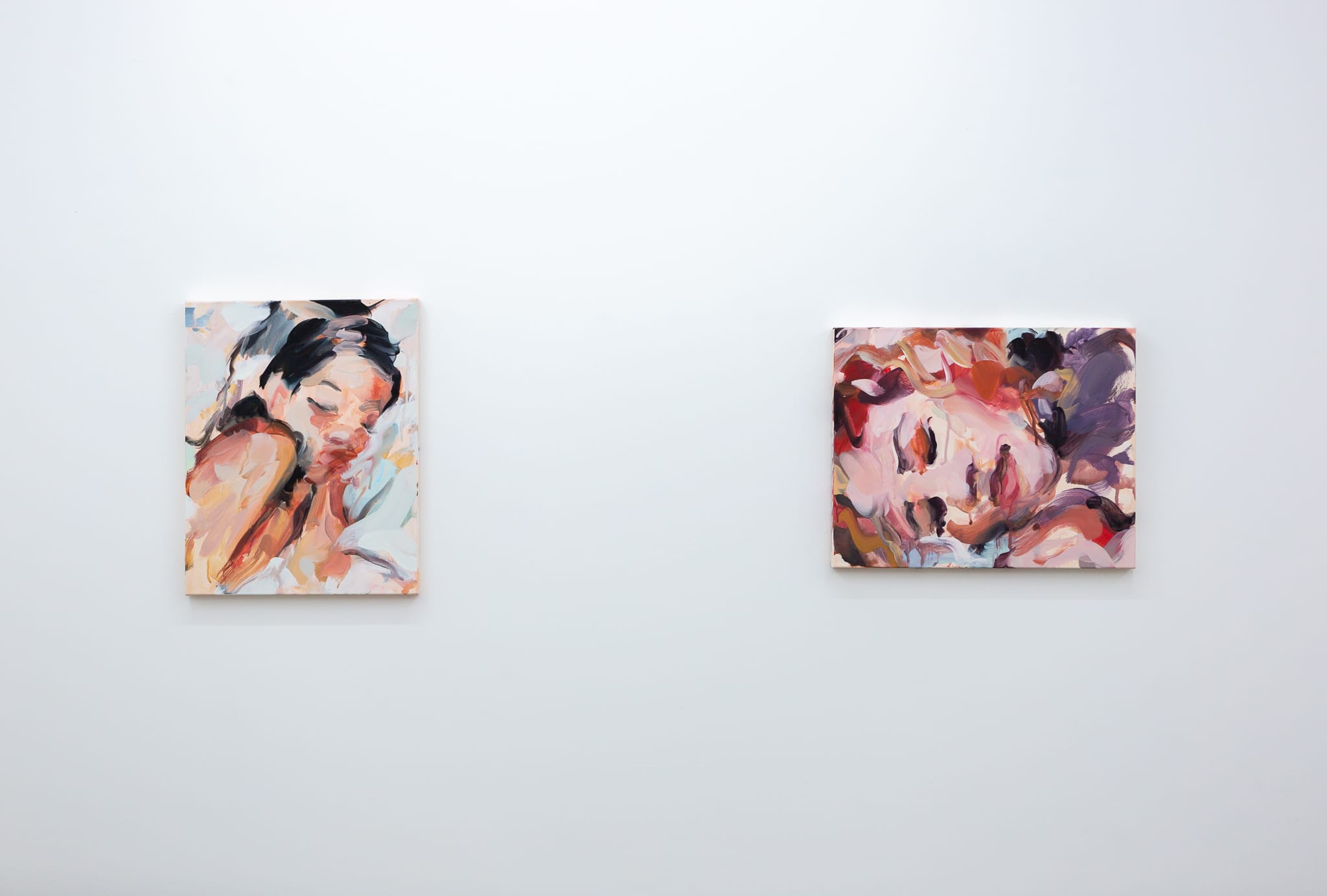 Installation shots of Laura Lancaster's solo show at Workplace London. Close up crop paintings of sleeping women and figures in landscapes, loosely painted.