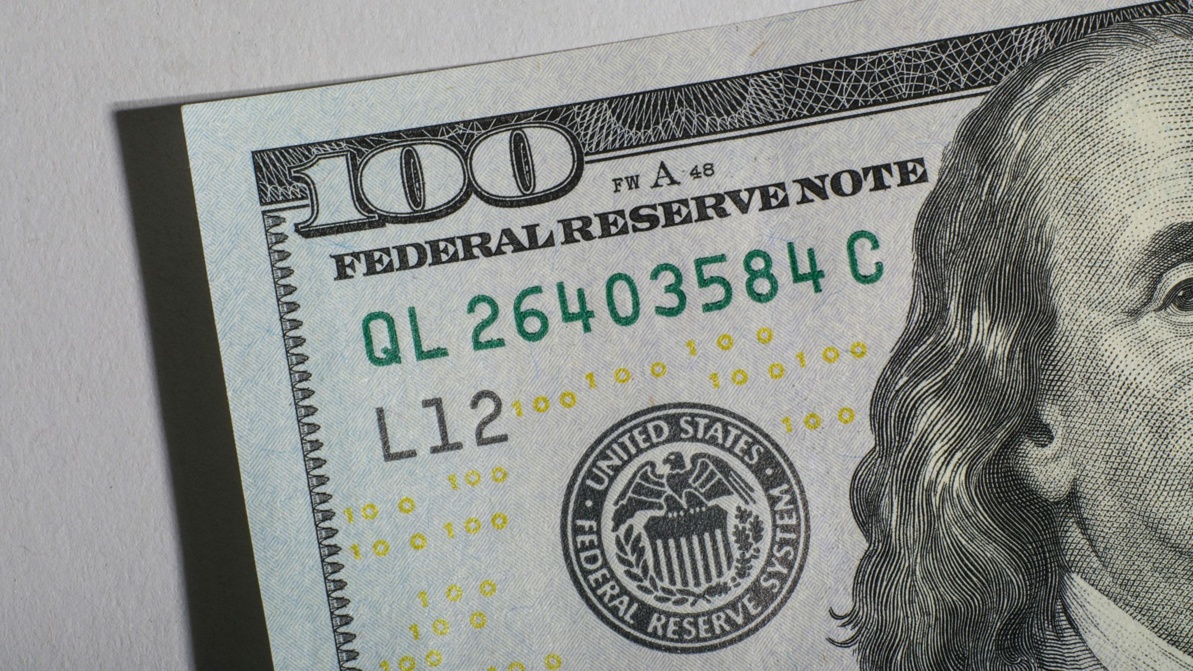 Partial image of a U.S. $100 bill