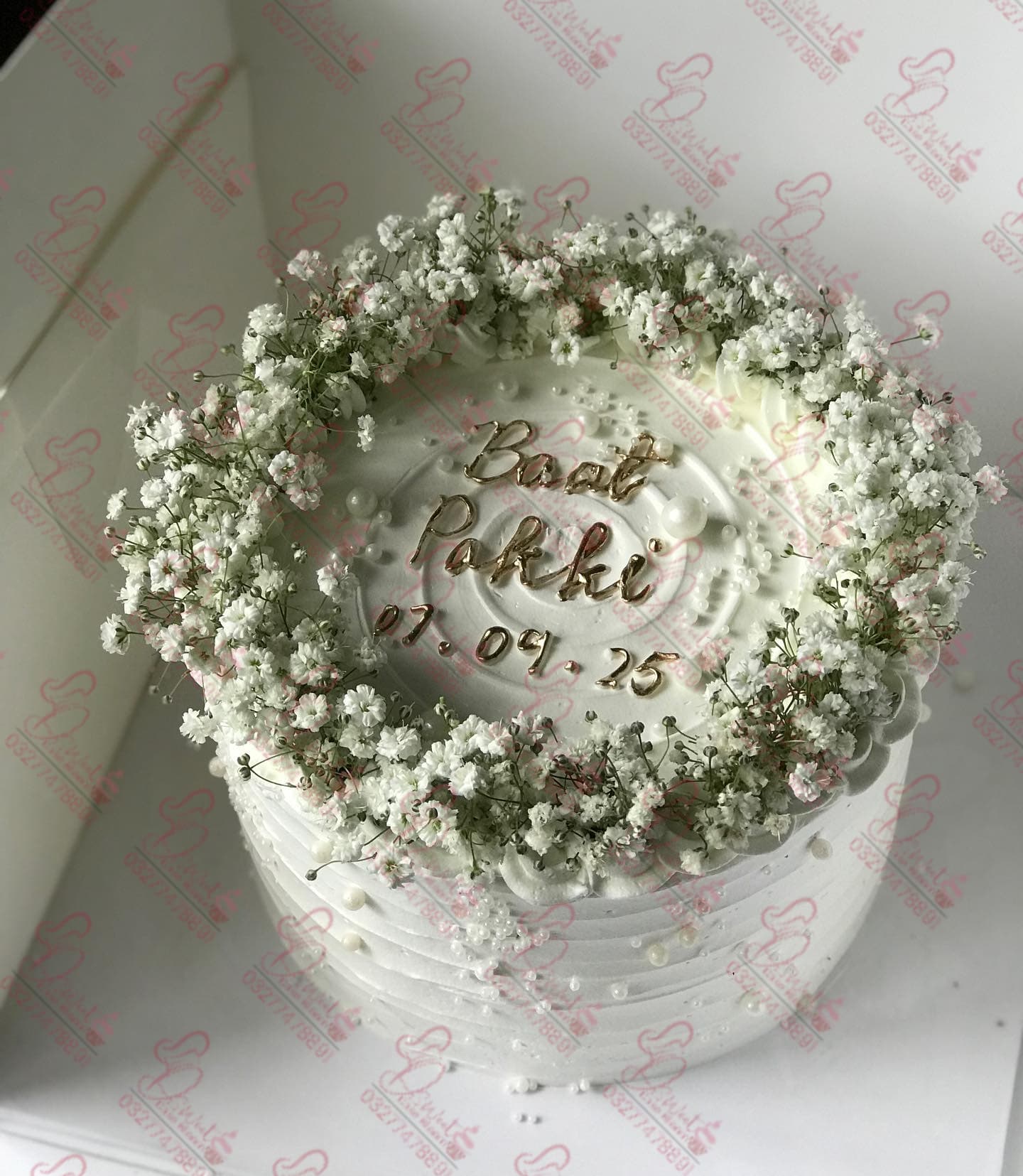 White Buttercream Baby Breath Wedding Cake Islamabad