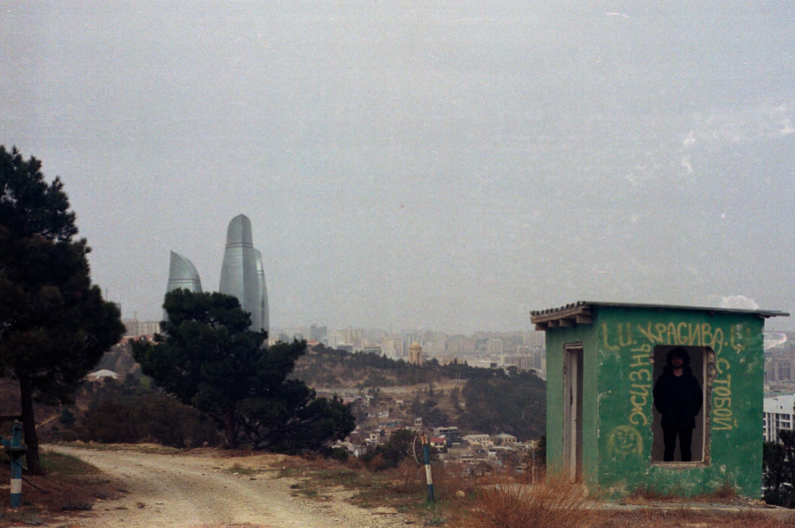 Me in a small structure in the Bayil neighborhood (maybe a toilet)