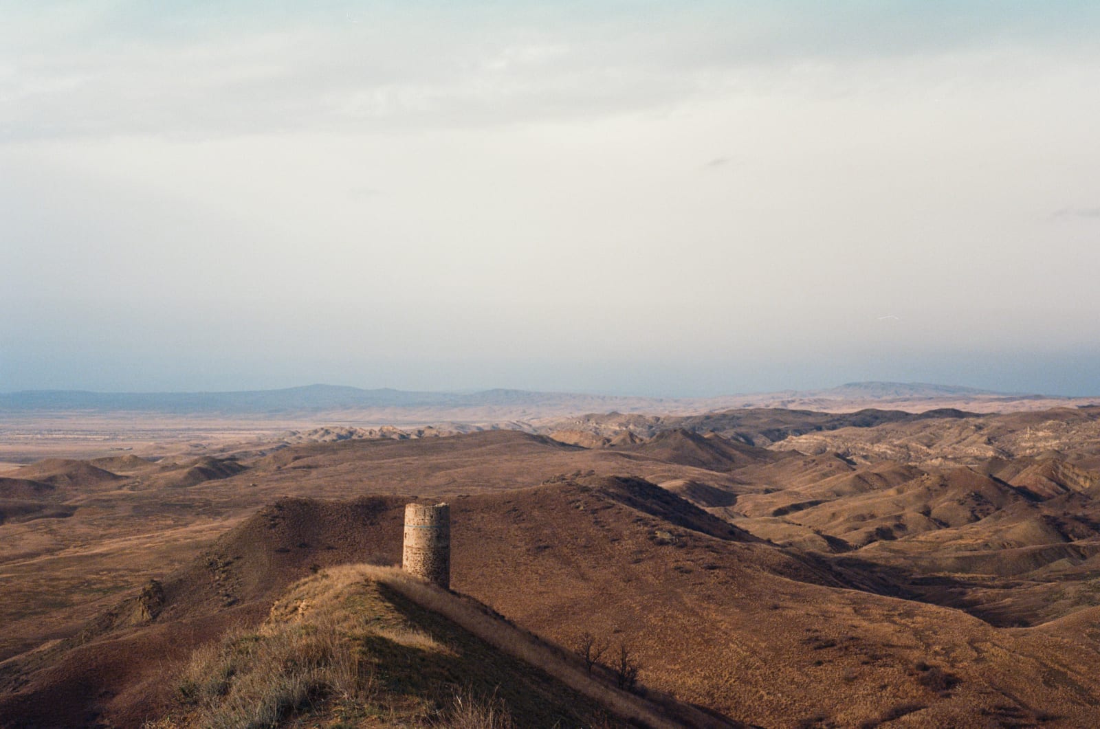 View of the Iori Plateau and the tower above Natlismtsemeli Monastery