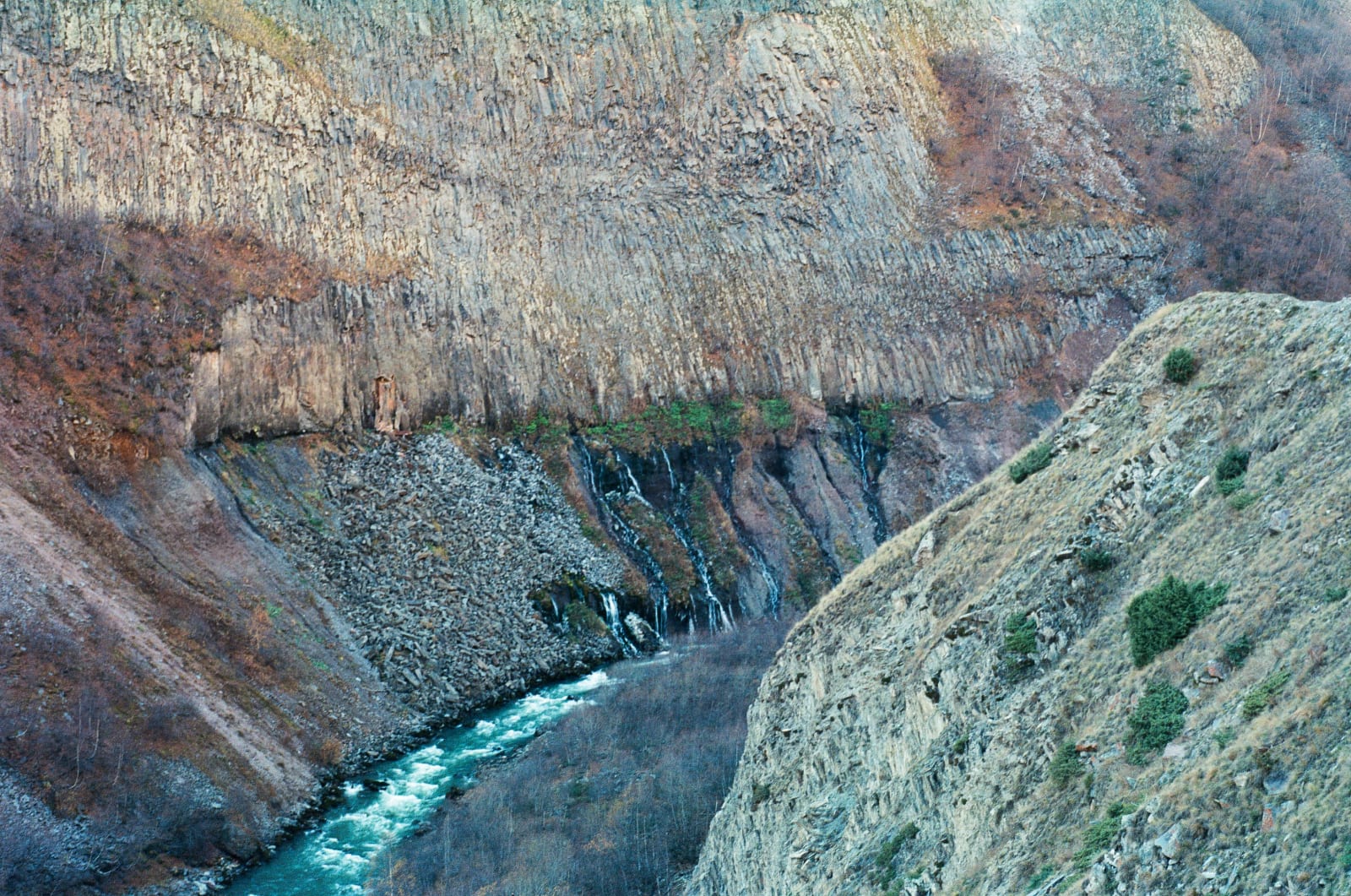 Water penetrating the side of a mountain