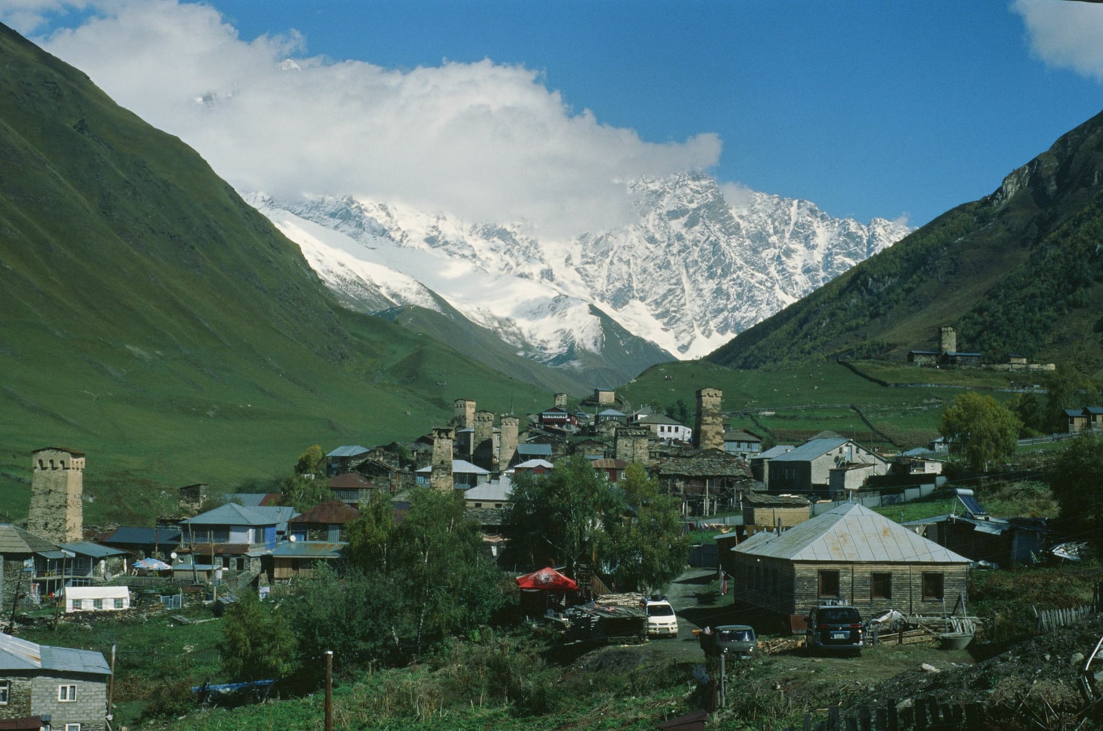 Ushguli from the south and the highest mountain in Georgia, Shkhara, in the background