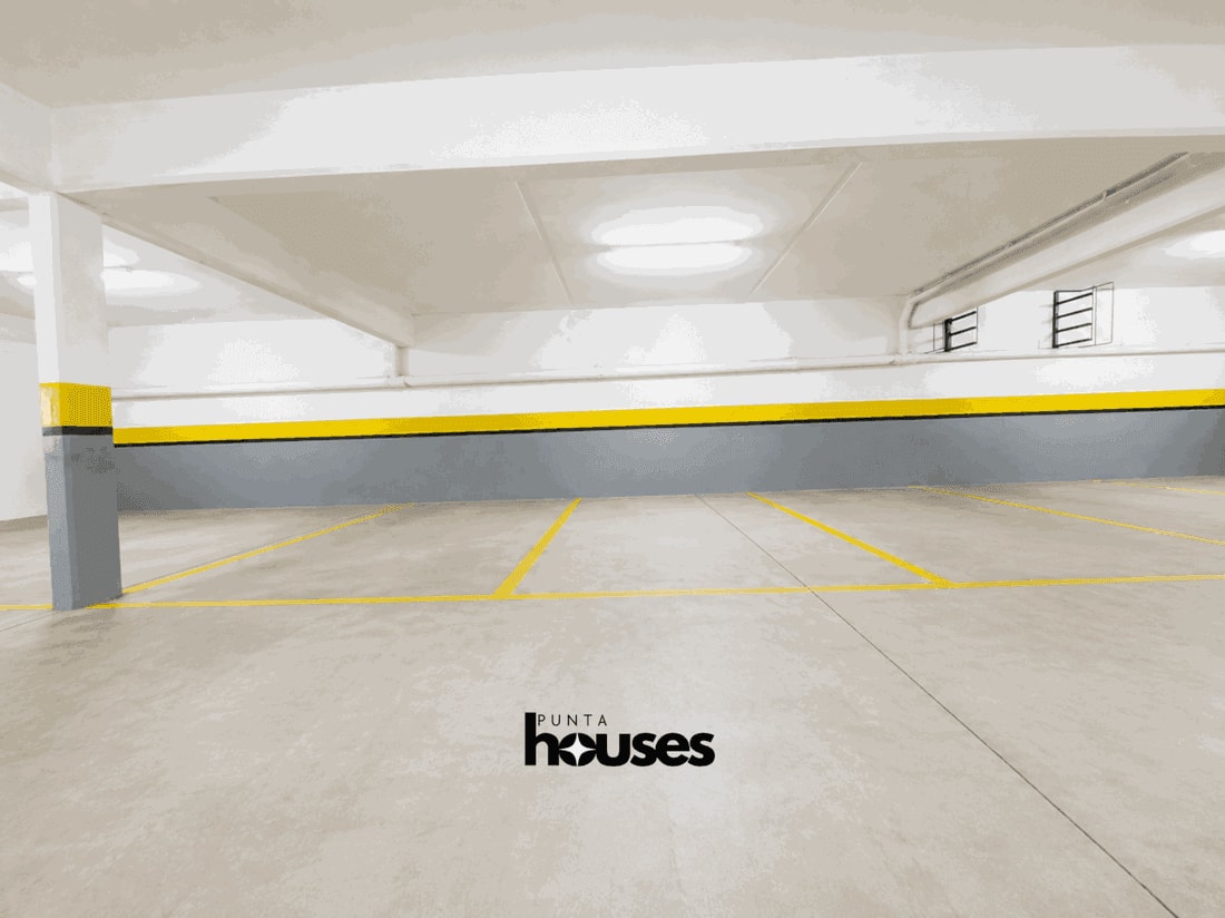 Covered underground parking spaces in Playa Brava apartment building