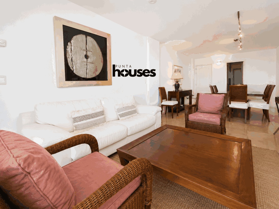 Spacious living and dining room with terrace and ocean view in Playa Brava