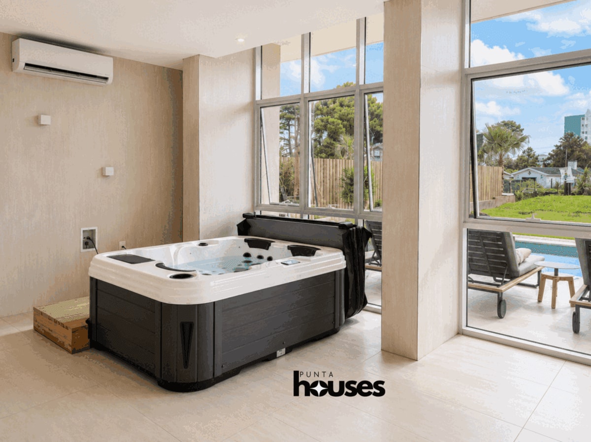 Private-style indoor jacuzzi area with abundant natural light and direct connection to the building's pool facilities.