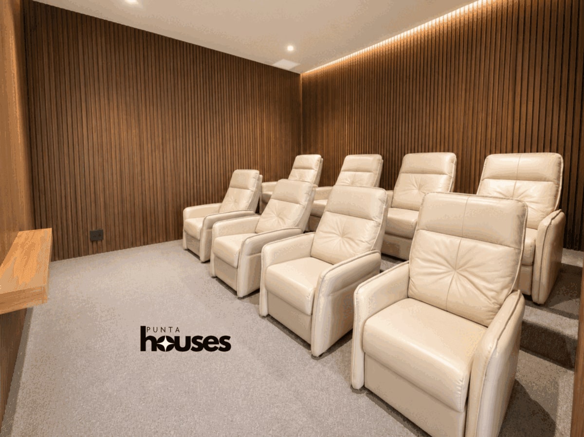 Private microcinema with reclining seats at View 2 residential building in Punta del Este Uruguay.