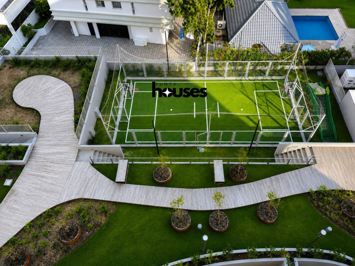 Multi-sport court surrounded by landscaped gardens at Manglar Brava residential complex Punta del Este.