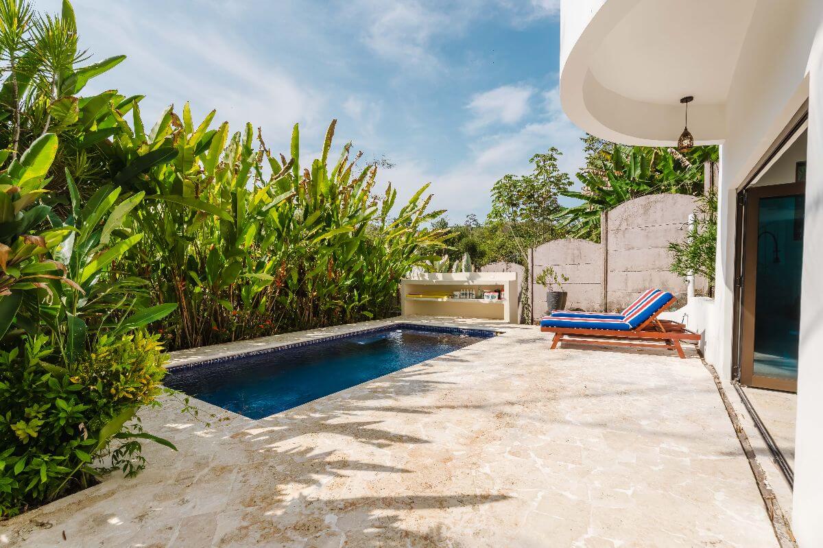 Secluded private pool area at Casa Iguana in Quepos, Costa Rica, surrounded by lush tropical greenery