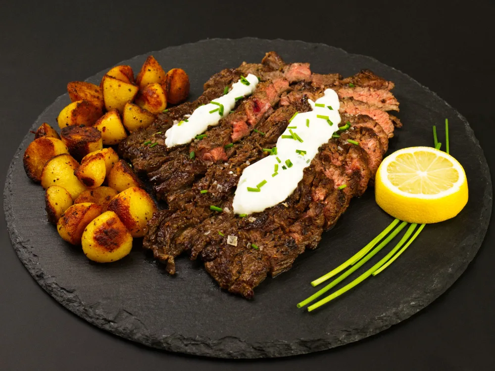 Bavette Steak with Garlic Yoghurt and Crispy Baby Potatoes Hero