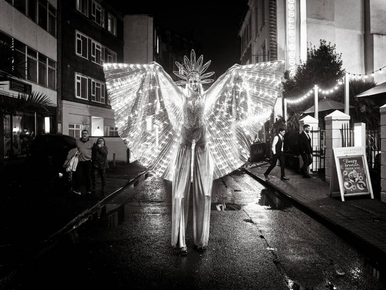 Lily outside Revolution, St. Nicholas Street, Bristol, March 2023. Photograph Copyright &copy; Simon Holliday