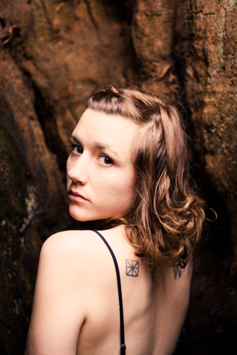 Sophie, Portrait Inside A Tree, October 2017. Photograph Copyright © Simon Holliday