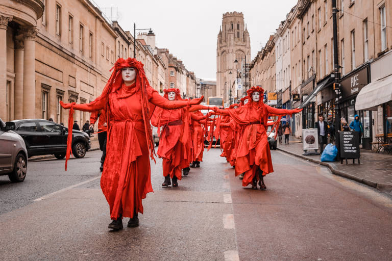 Red Rebel Brigade at a protest against the expansion of Bristol Airport, Bristol, January 2020. Photograph Copyright &copy; Simon Holliday
