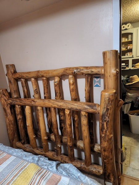 One of a kind Aspen log bed frame. Queen.