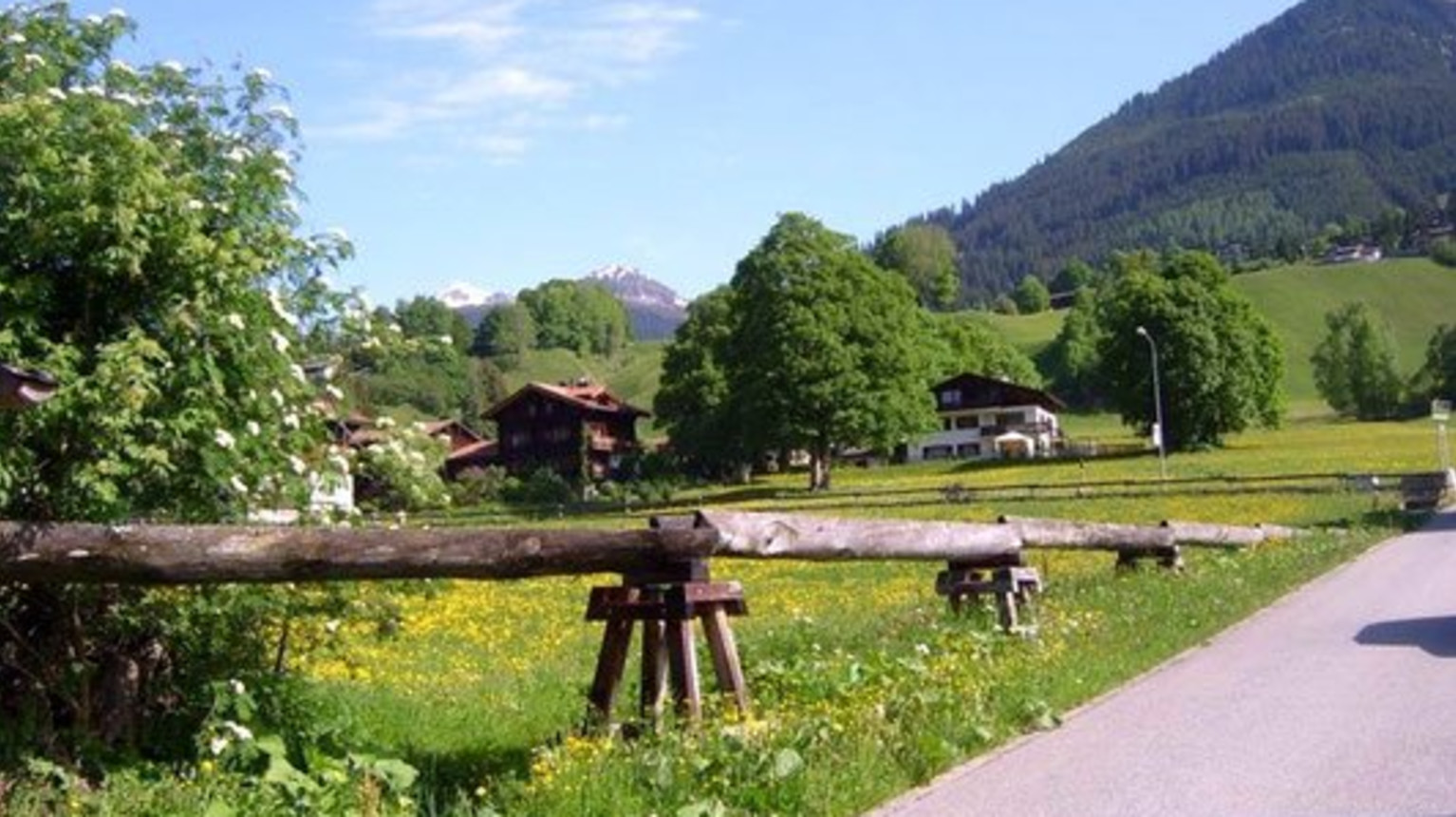 The water from the stream is channelled and led to and from the water wheel through wooden races.