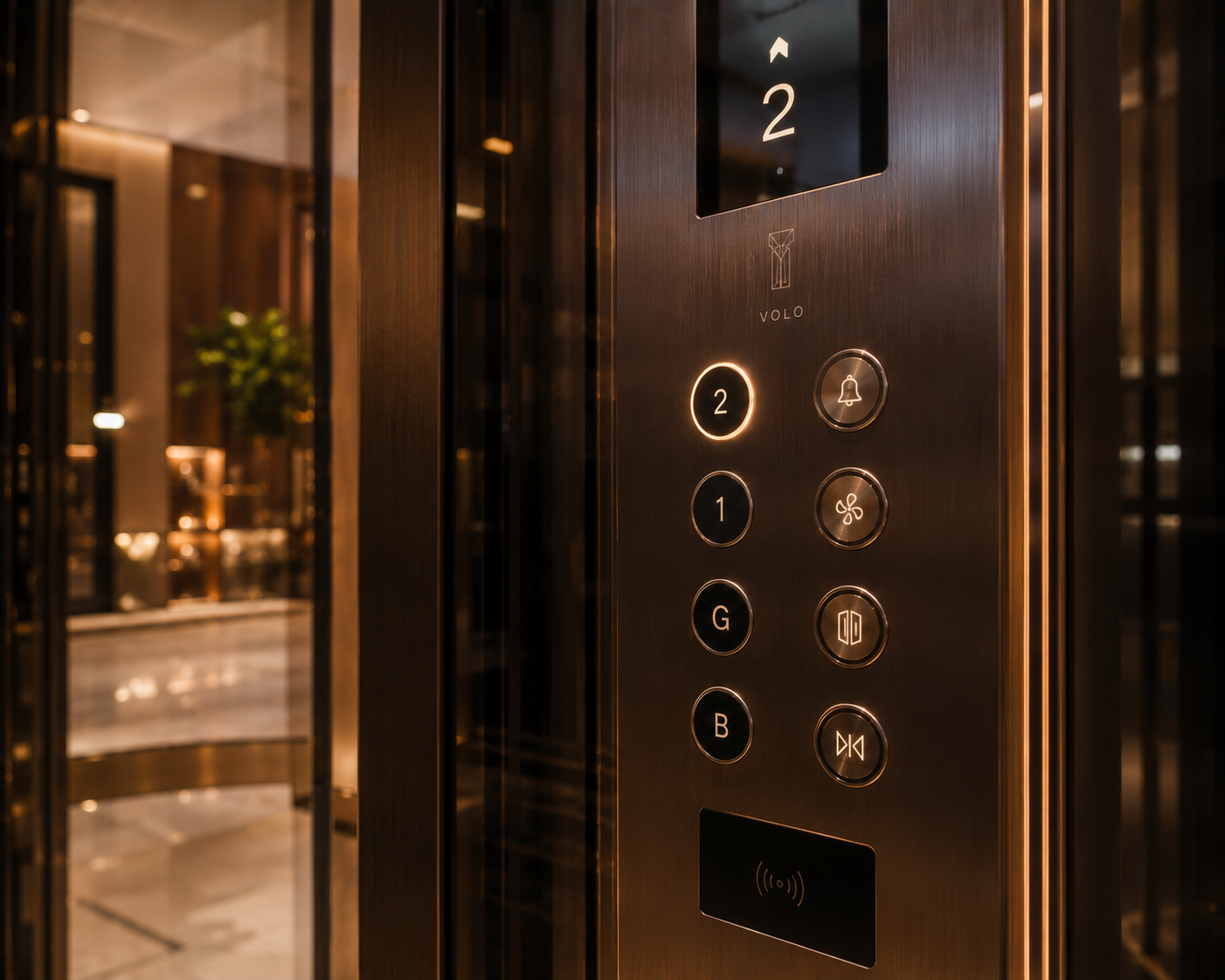 Luxury panoramic elevator control interface with precision metallic detailing by Volo Lifts