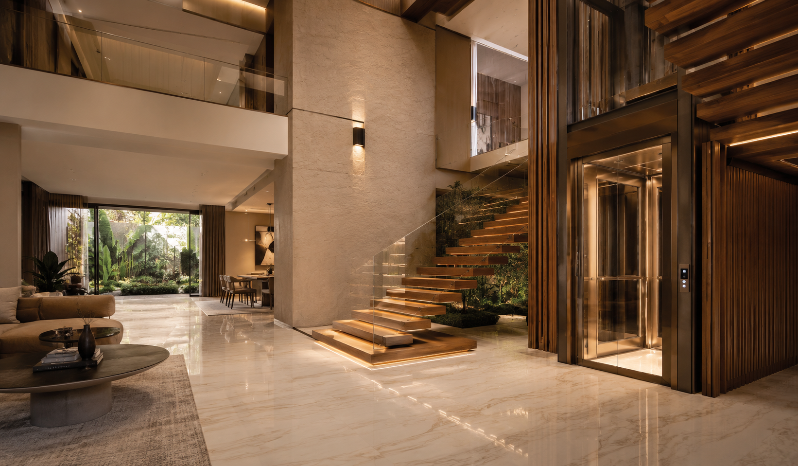 Luxury contemporary Bangalore villa interior with integrated panoramic residential elevator and floating staircase