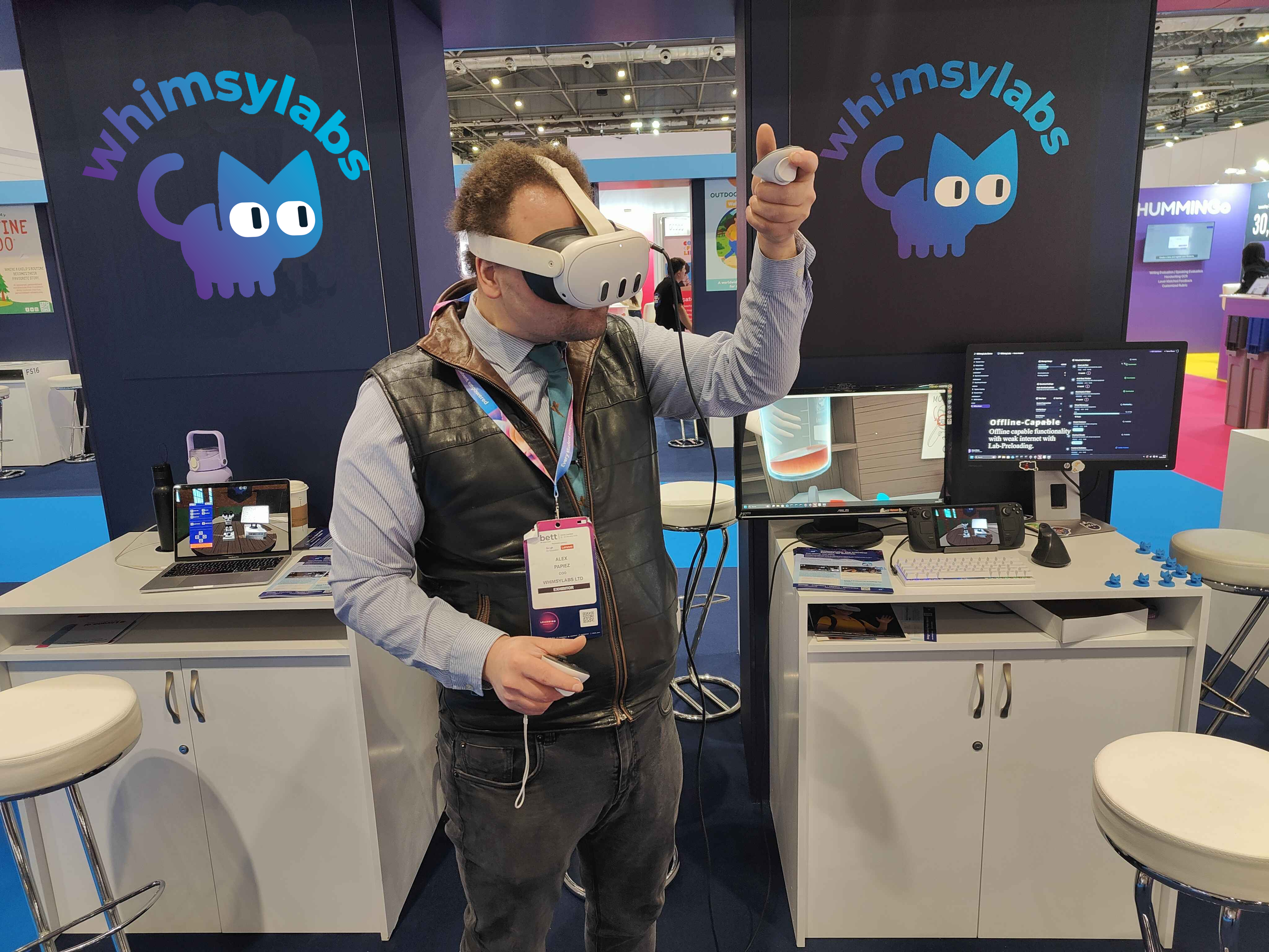 WhimsyLabs booth at BETT 2026 with visitors experiencing the virtual laboratory