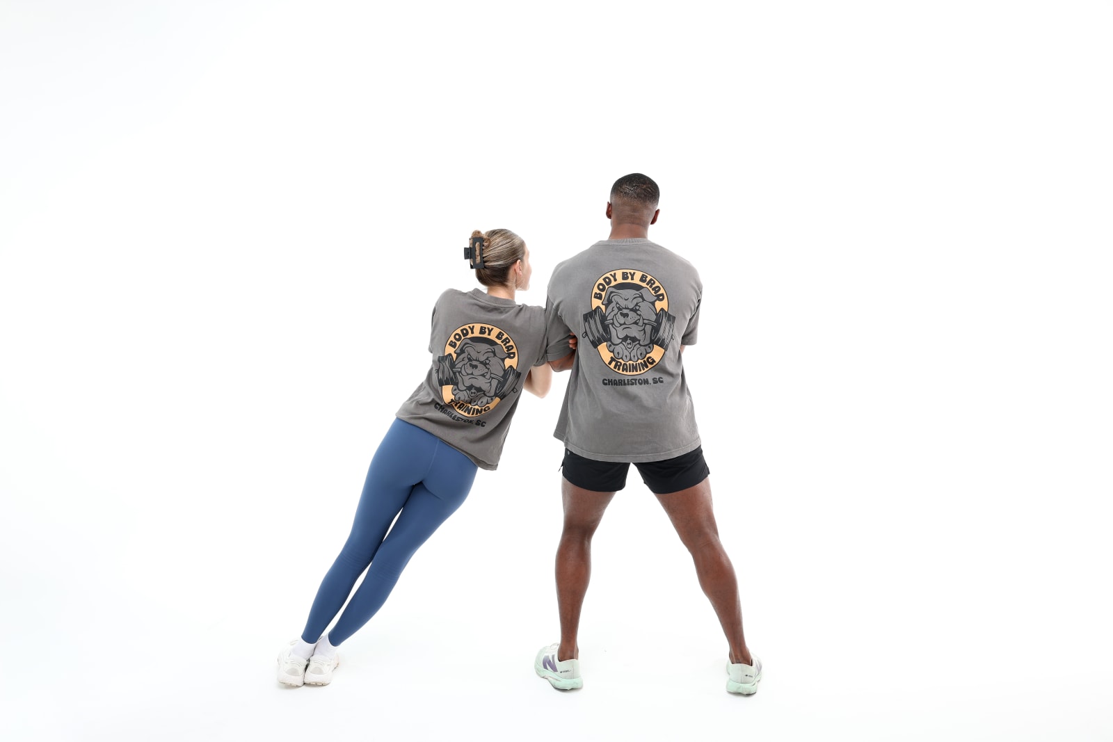 Personal trainer coaching a client through a strength session in Charleston SC