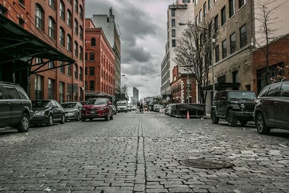 Historic cobblestone streets and converted loft buildings in the Tribeca neighborhood