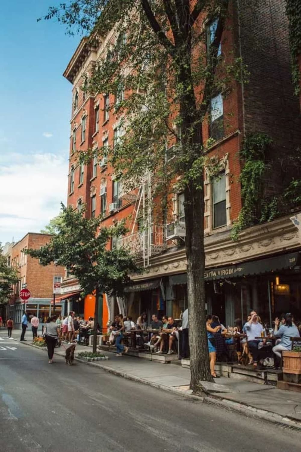 Outdoor dining on a walkable West Village street in Manhattan