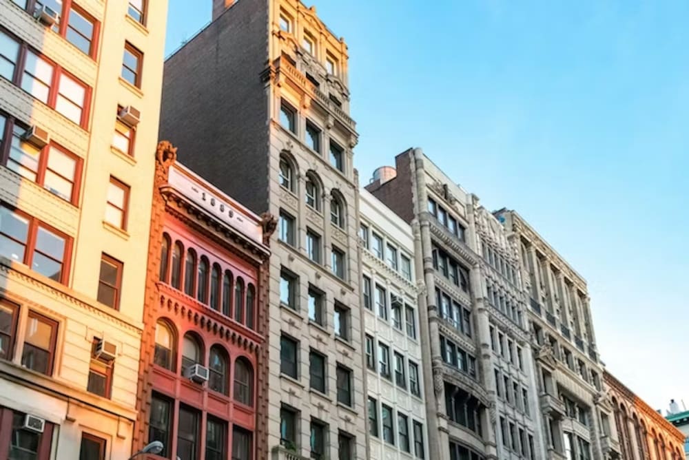 Downtown Manhattan skyline at sunset highlighting premium luxury real estate locations