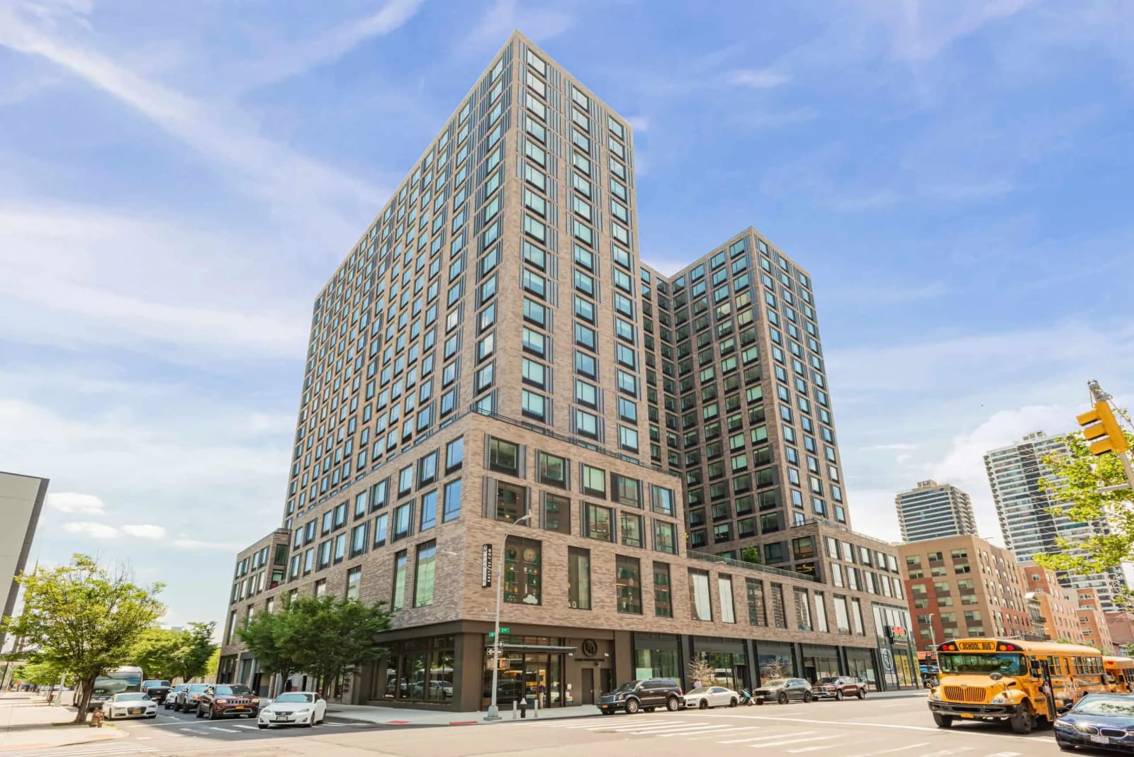 Exterior facade of a luxury condominium tower in the Flatiron District