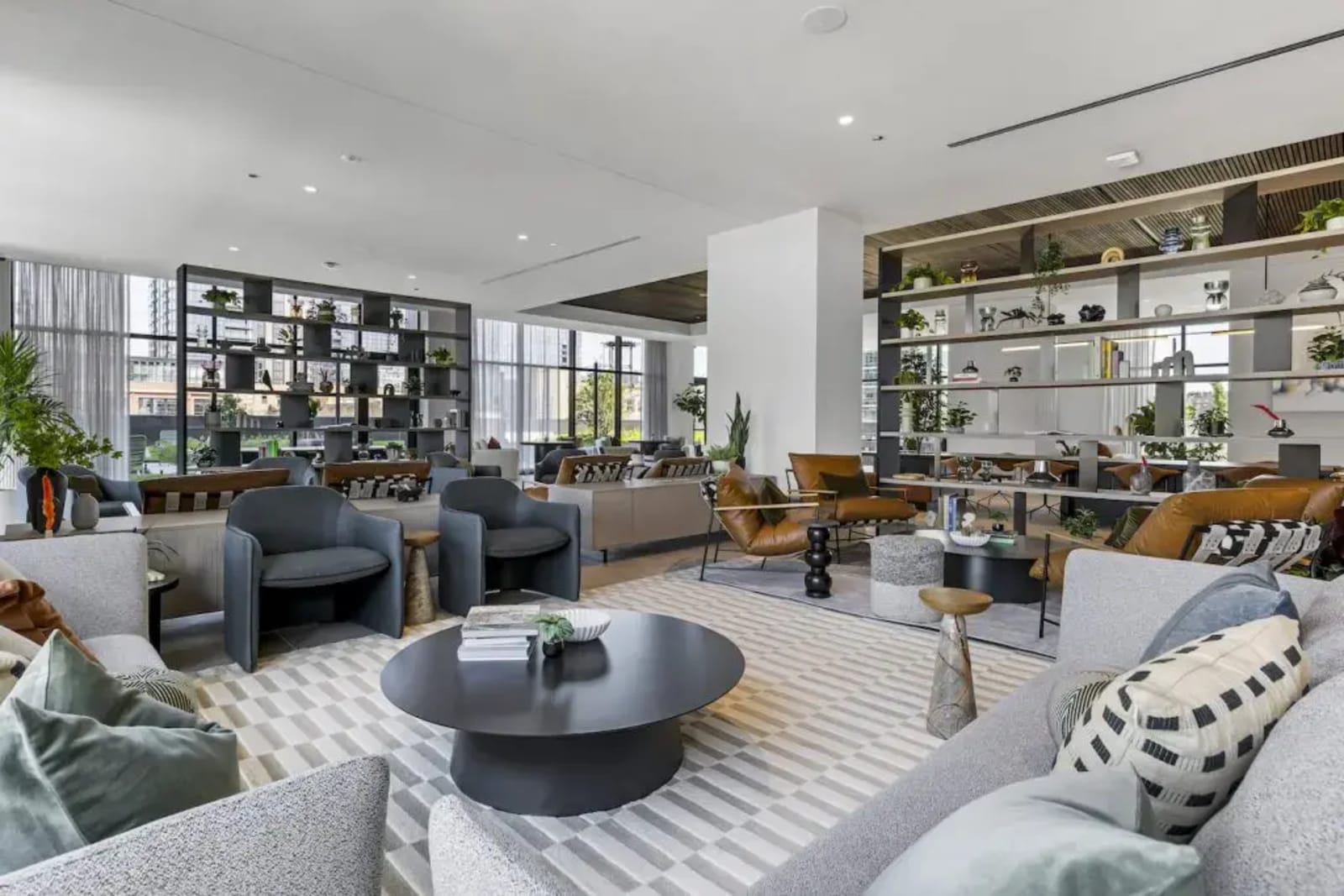 Luxury Manhattan apartment interior with floor-to-ceiling windows and contemporary finishes