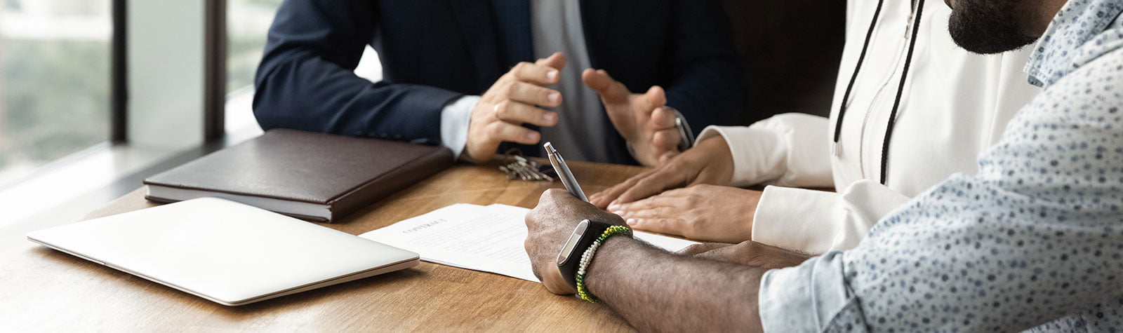 NYC real estate closing costs overview with documents and keys on a table