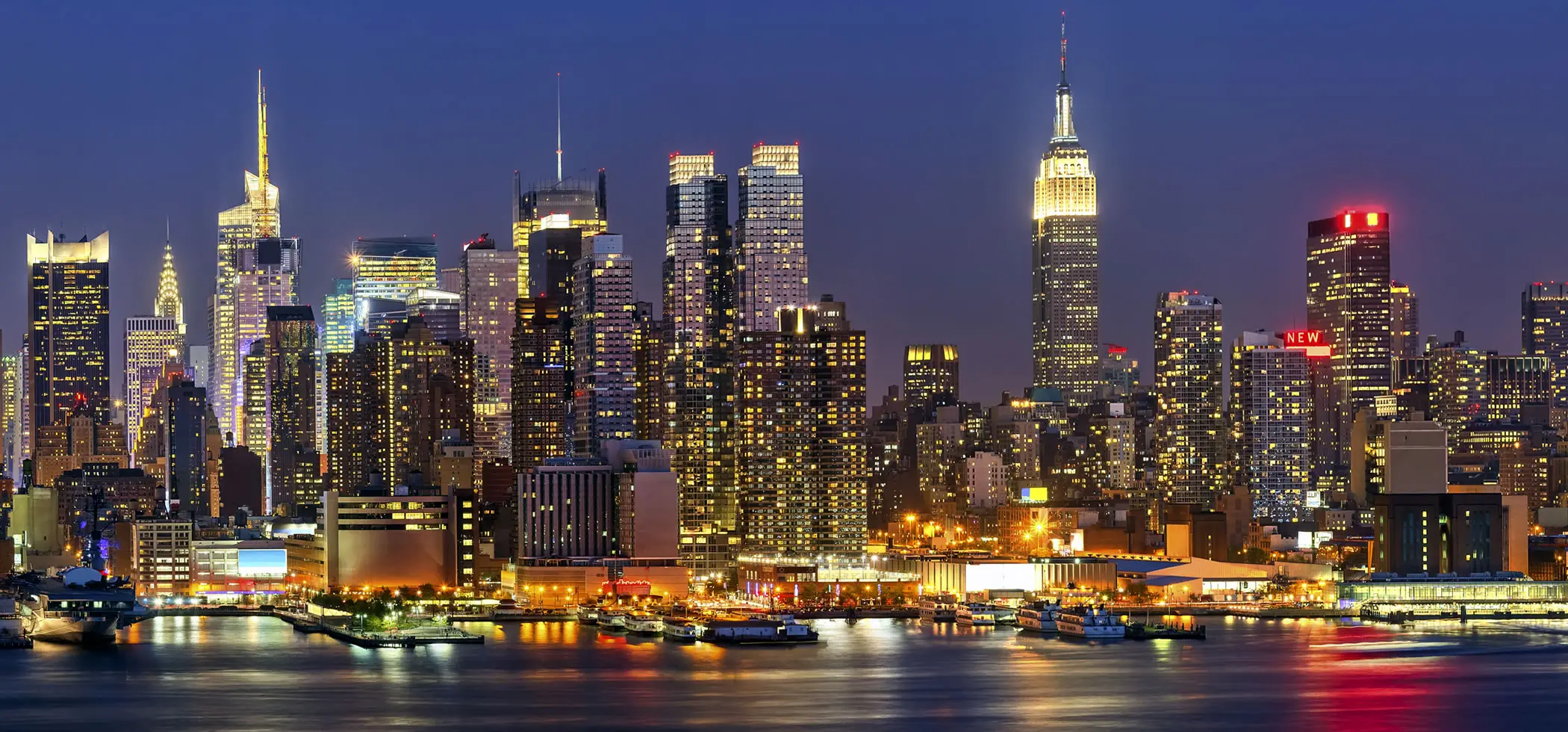 Manhattan skyline aerial view at dusk with luxury residential towers