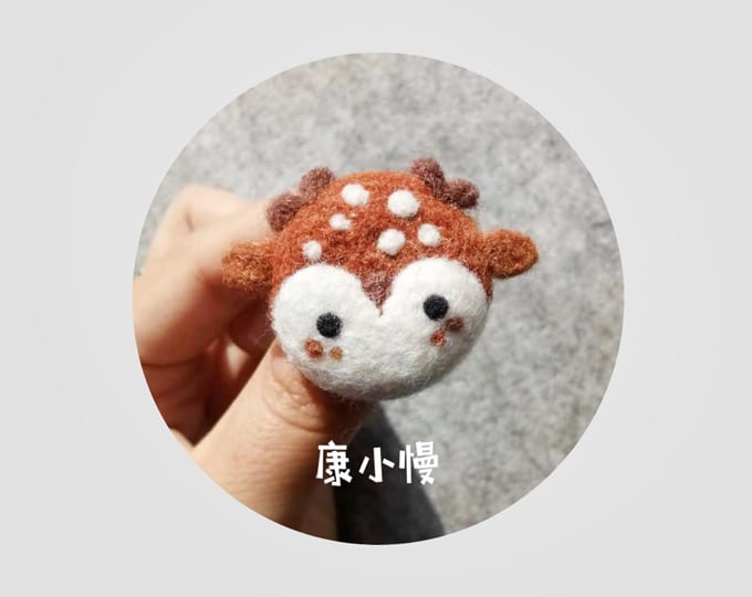 Handmade brooth and hair loop with original design. " Christmas deer "