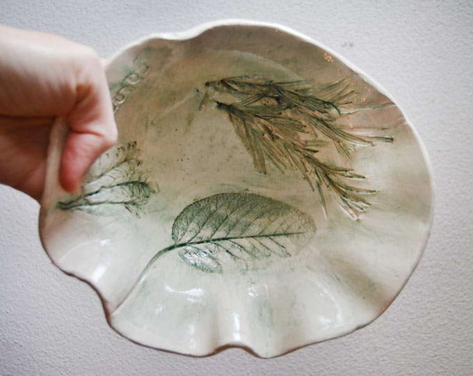Handmade bowl with embossed leaves
