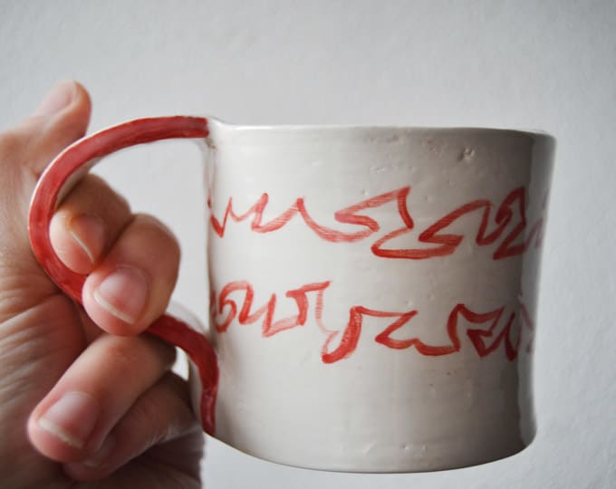 Handmade decorated ceramic mug