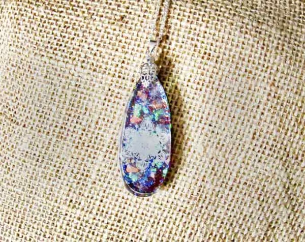 $40 shipped #holographic #pendant with #mylar #mandala #design & #magenta #backround  hung on #silver #chain #resinart #resinartist #handma…