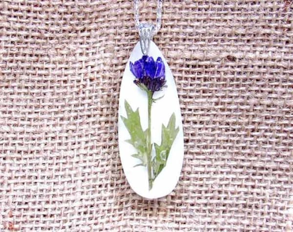 $45 shipped #purple #nettle on #white background #pendant #necklace #driedflowers #necklacesofinstagram #pendantsforsale #pendantsofig #res…