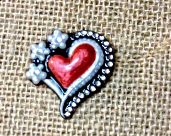 #Red #heart #heartshaped #brooch with #rhinestones inlaid individually & #white #pearlescent accents on #black background