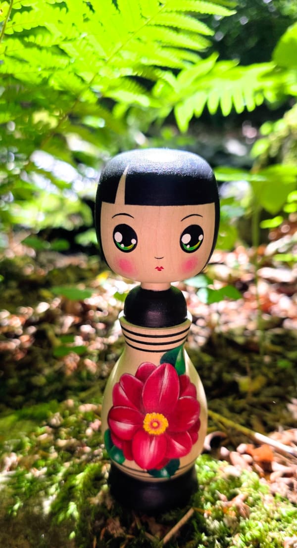 Lime wood kokeshi style doll with red camellia