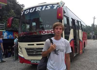 Guest with World Touch tourist bus in Kathmandu