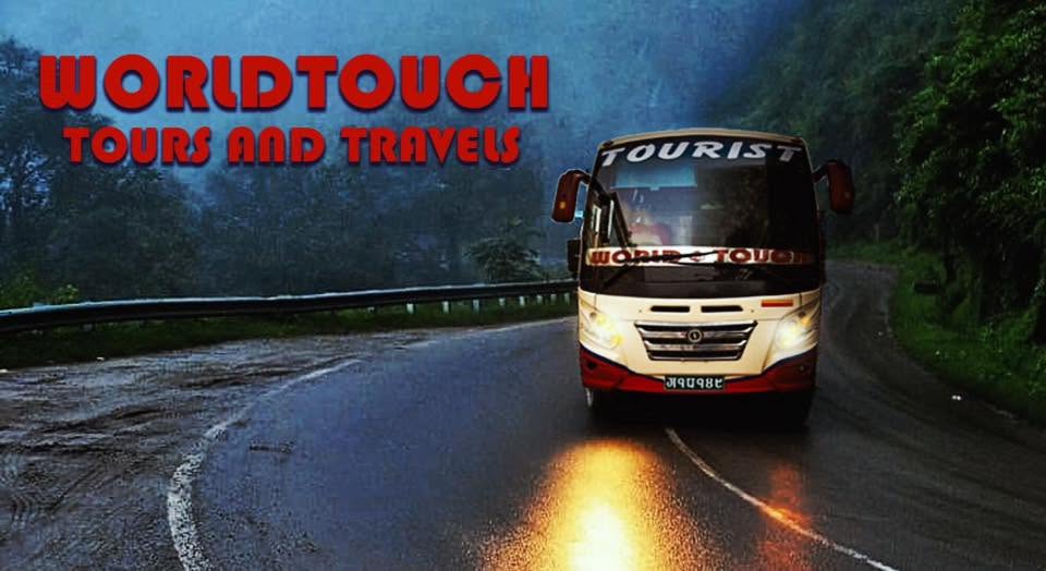 World Touch tourist coach on a scenic highway in Nepal