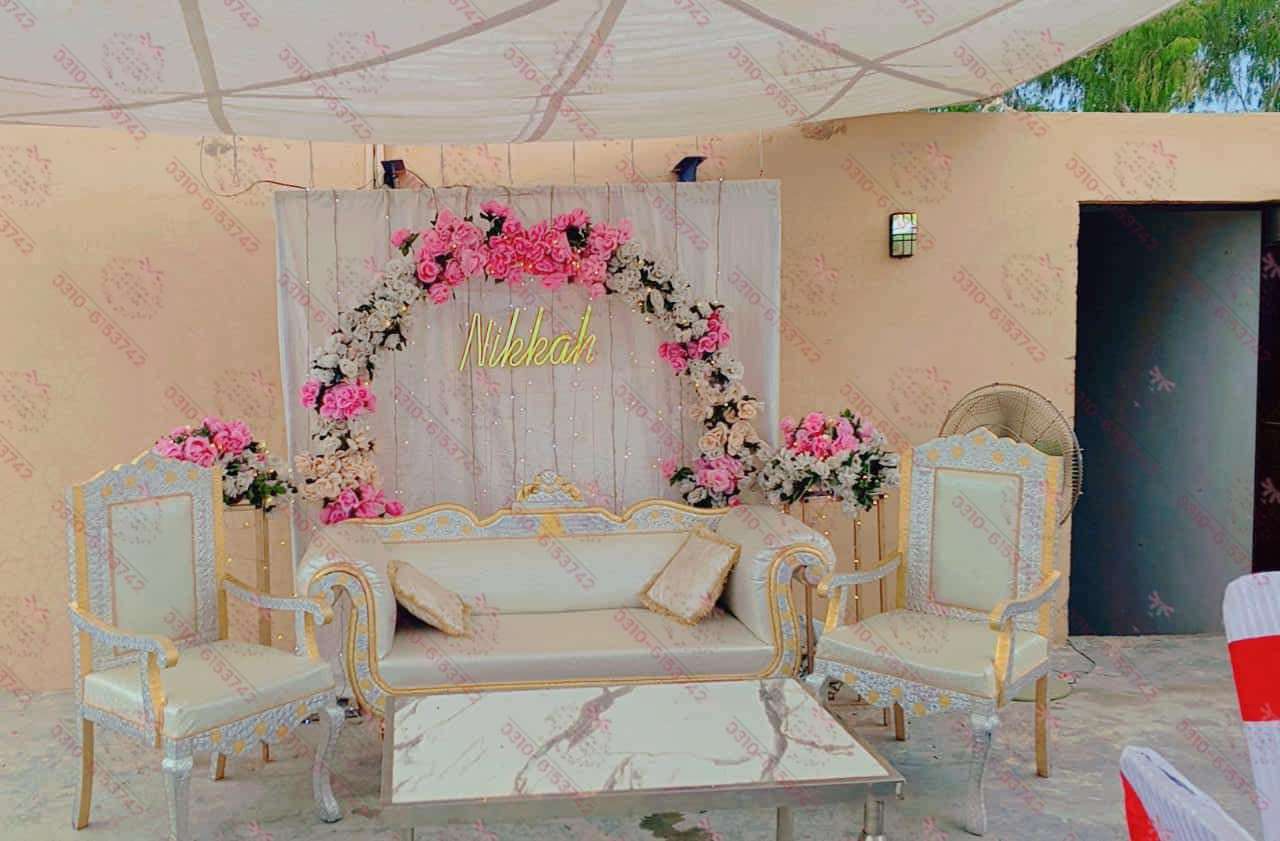 Nikkah event decor in Lahore with elegant floral backdrop setup