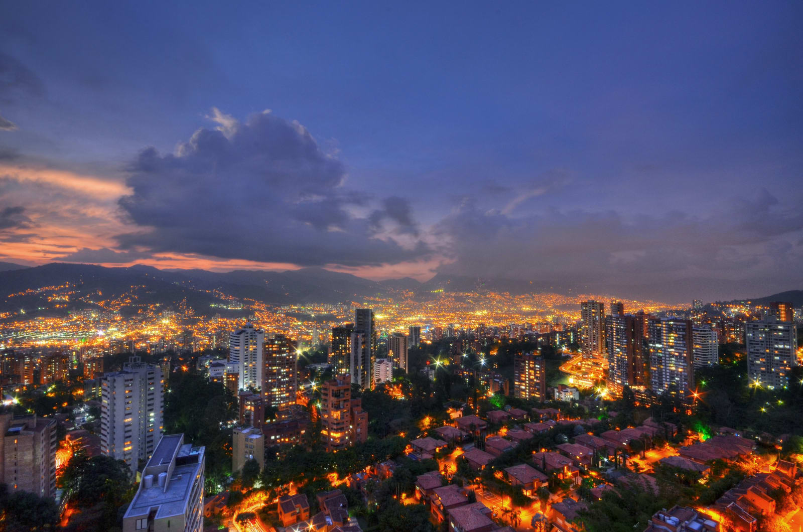 Medellín at sunset, home of the Colombia Care Dental clinic, a one-hour flight from Bogotá