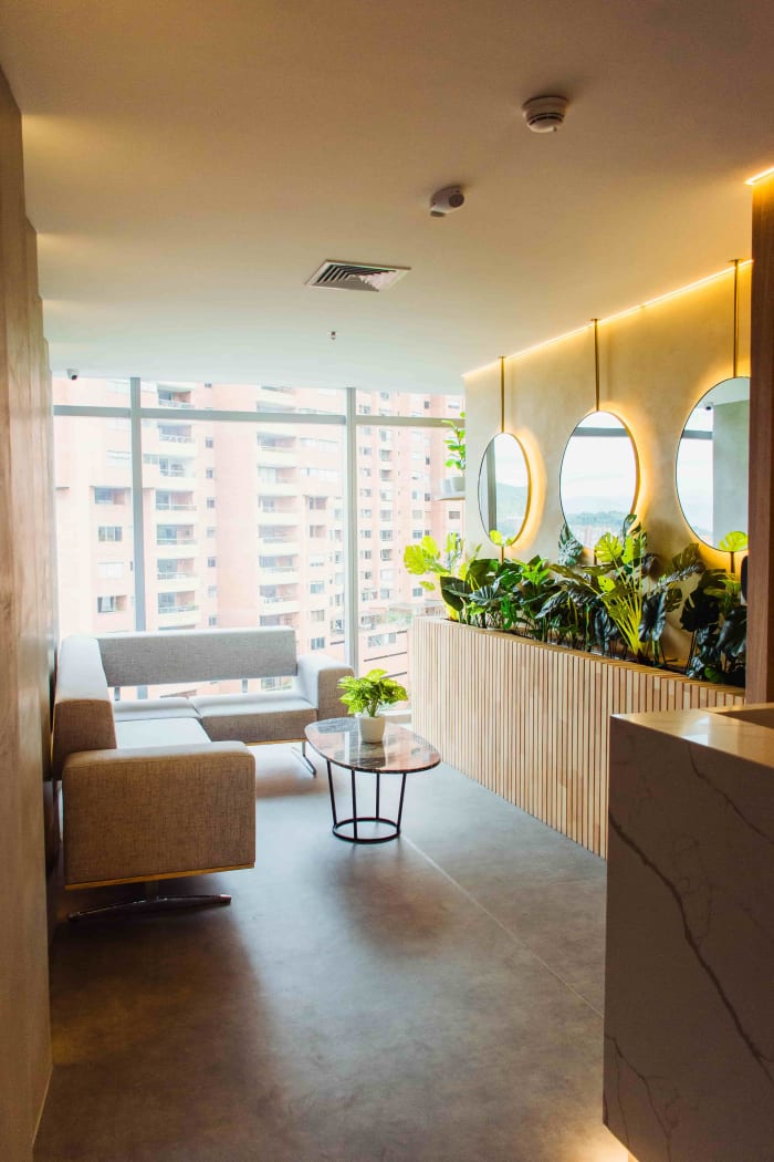 Colombia Care Dental waiting room with city view, Medellín
