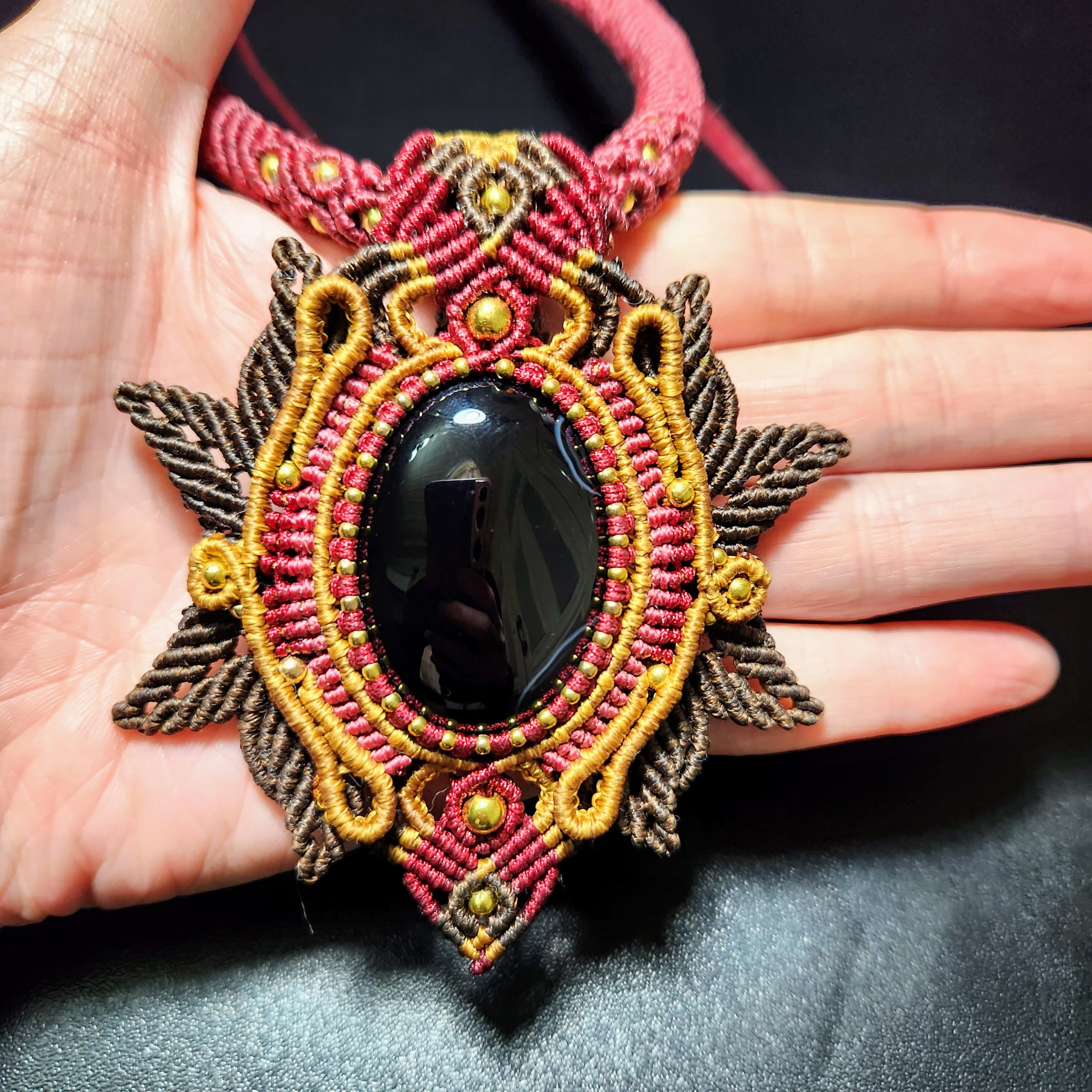 Handmade Macrame Necklace with Black Onyx Stone - Unique Hippie Boho Jewelry. Features delicious dark brown, golden, and red colors.