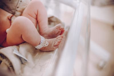 New father Pat McAfee reveals his son's arrival after a challenging pregnancy journey