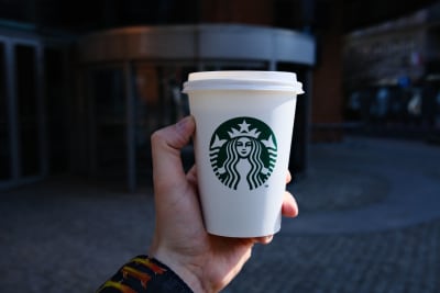 Starbucks Stock Surges Amid Corporate Restructuring and 300 Layoffs